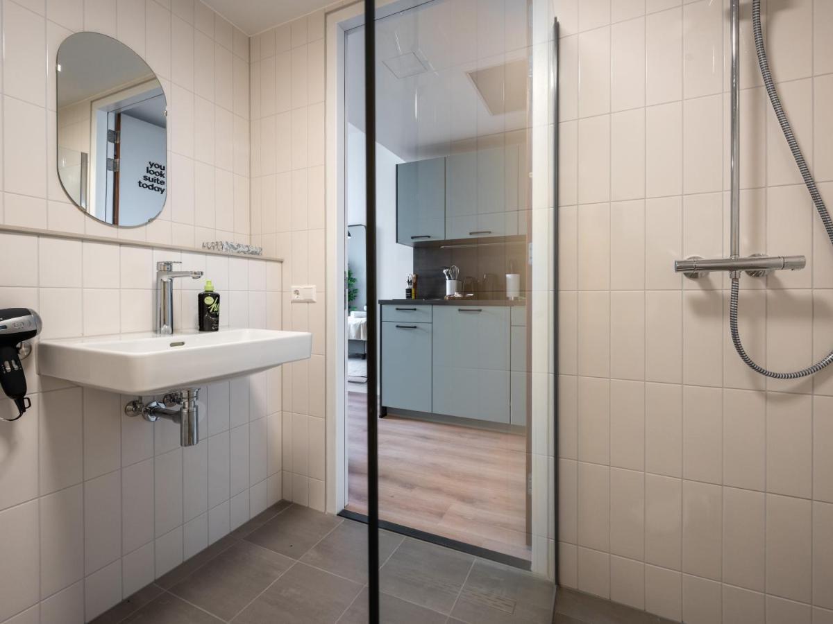 Limehome Eindhoven Gashouder Bagian luar foto