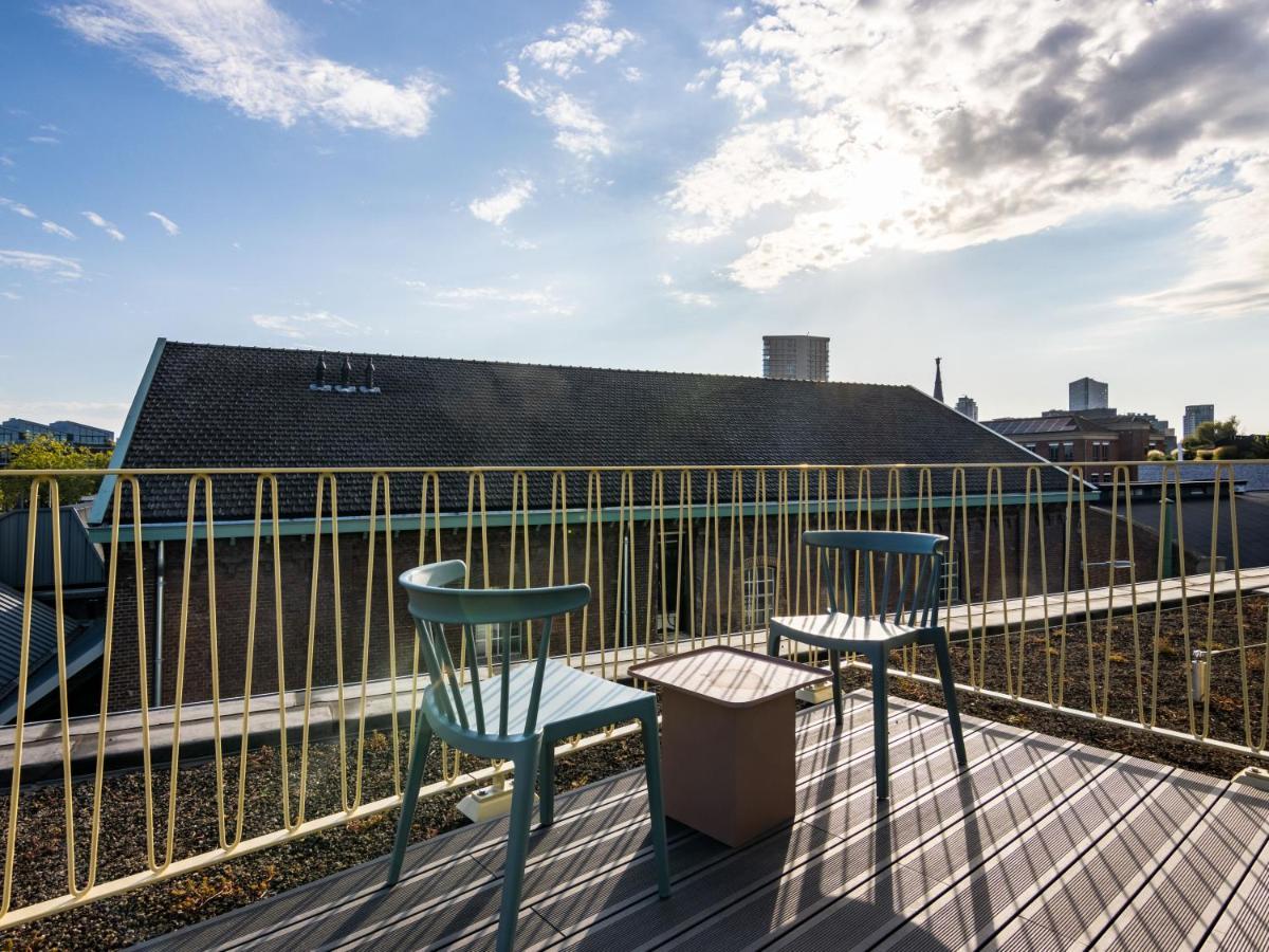 Limehome Eindhoven Gashouder Bagian luar foto