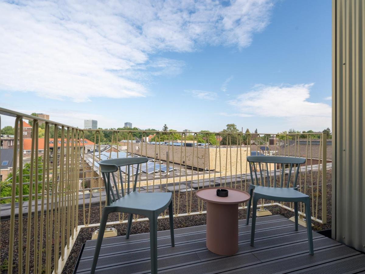 Limehome Eindhoven Gashouder Bagian luar foto