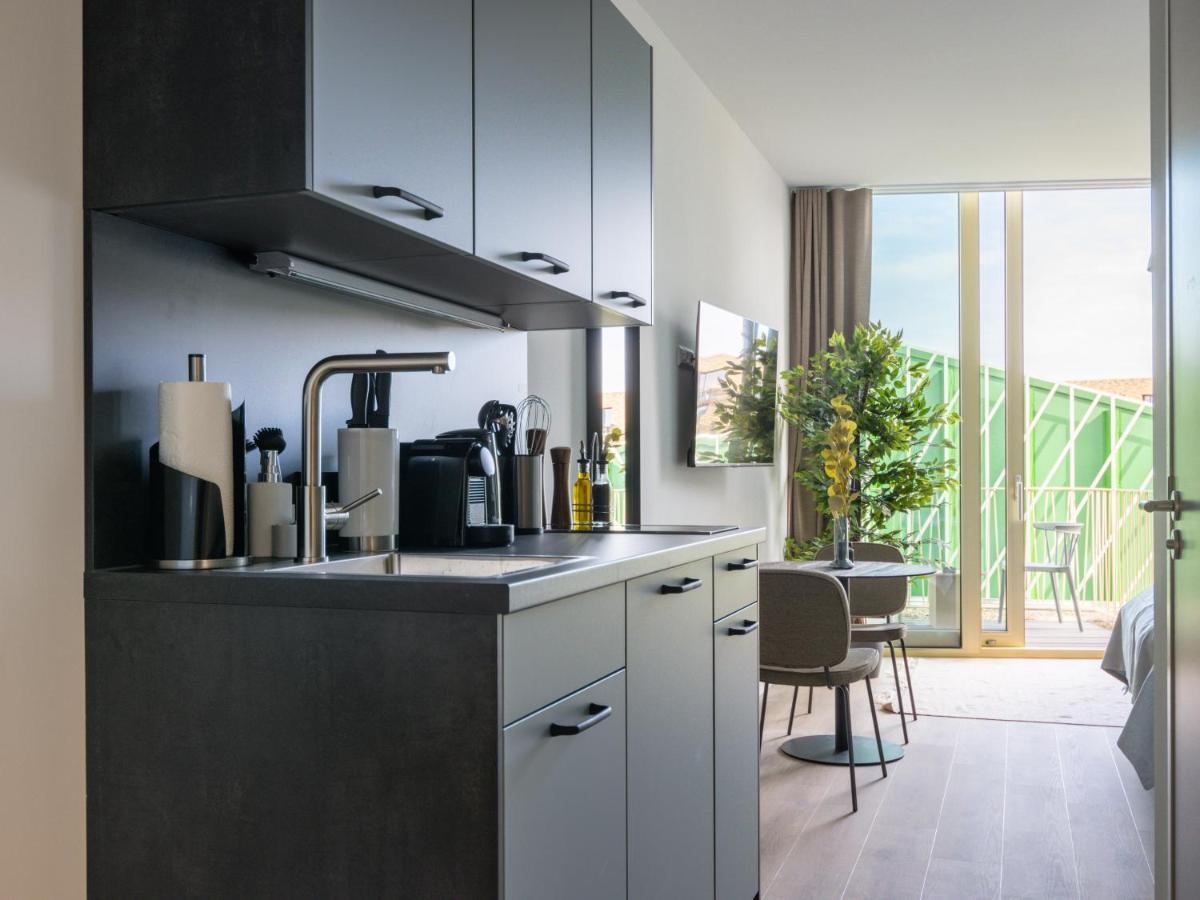 Limehome Eindhoven Gashouder Bagian luar foto